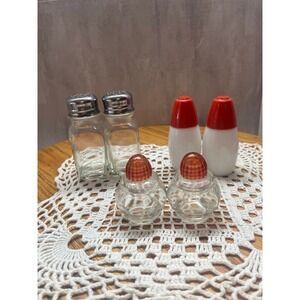 Lot of three salt and pepper shaker set